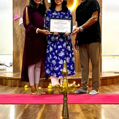 We celebrate each student's journey. Here, we are presenting a certificate of completion, marking the successful end of a transformative training program.
