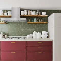 This kitchen design uses a bold magenta on the lower cabinets, balanced with a green hexagonal tile backsplash and open live-edge wood shelves for a unique, eclectic look.