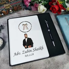 For the advocate in your life, this personalized diary and pen combo is a perfect gift. The diary features the lawyer's emblem and can be customized with their name, photo, and title.