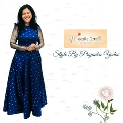 An elegant evening gown created from a client's satin silk saree. The rich blue fabric and simple polka dot pattern were perfect for this full-length gown design, and I used the saree's original border for the sleeves.