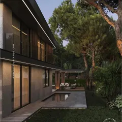Another view of how linear facade lighting can transform a property at night. The continuous glow provides a sophisticated and contemporary feel, enhancing the home's architectural details.
