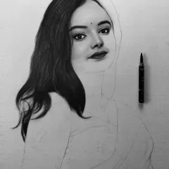 A work-in-progress shot of a portrait, showing the face and hair fully rendered before moving on to the clothing. This layering method is key to realism.