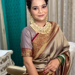 A smiling portrait of the mother, looking graceful and radiant.