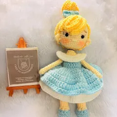 A magical Cinderella amigurumi doll, standing 8 inches tall. I crafted her beautiful blue ball gown and signature hairstyle from soft cotton yarn.