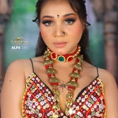 A direct portrait showing the intensity of the smokey eyes and the traditional bindi and nose pin. The makeup is powerful yet clean.