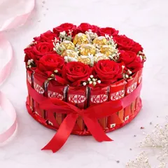 For when you want to give something truly special, I make these chocolate and rose hampers. This one is made with KitKats and Ferrero Rochers, arranged with fresh roses to look like a beautiful, edible cake. It’s perfect for anniversaries and big celebrations.