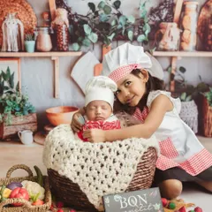 Bon appétit. This "Mini MasterChef" themed shoot with a newborn and their older sibling is a recipe for cuteness.