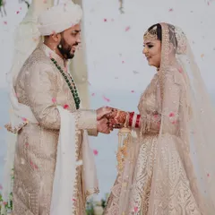 During their seaside Nikah ceremony in Thailand, the bride and groom exchange vows as flower petals rain down. This is the heart of my work: capturing the profound, emotional promises that are made, framed by the beauty of the destination.