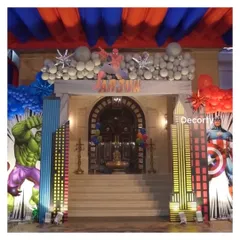 Your friendly neighborhood Spider-Man welcomes guests to an action-packed superhero party. This entrance transforms a home into a hero's headquarters, with the Hulk and Captain America standing guard.