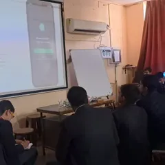 We keep our curriculum current with the latest technological advancements. Here, students are learning about the capabilities and applications of large language models like ChatGPT.