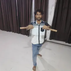 My student Mohd Farman holding the nunchucks. He is learning to handle this difficult weapon, building discipline and focus with every practice session.