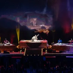 On stage with my full band of incredible musicians. For larger shows, we expand the sound with bass, guitar, keys, and a variety of Indian and Western percussion to create a rich, orchestral fusion.