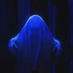A tighter shot of the blue ghost from my Halloween special. This view emphasizes the texture of the sheet and the creepy hands, making the figure more menacing and mysterious.