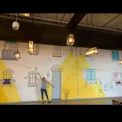 The completed 67-foot mural at the Wipro office in Bangalore. This was a technically challenging project that involved replicating a detailed design inch-by-inch onto a massive wall.