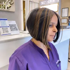 Another view of this stylish bob haircut, showing how it perfectly frames the face and highlights the cheekbones.
