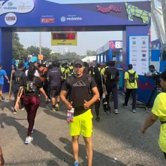 At the starting gate of the Vedanta Half Marathon, surrounded by thousands of fellow runners. The energy at these events is incredible and a huge source of motivation.