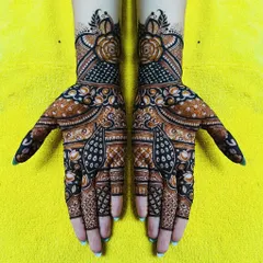 A stylish and contemporary design featuring roses and peacock feathers. The use of dark and light shading gives this piece a 3D effect.