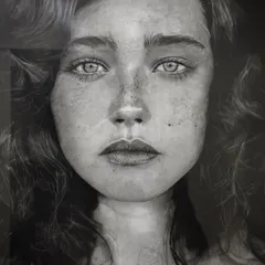 This is one of my most detailed hyper-realistic portraits, created using charcoal. It took over a year to complete, working on and off, and shows the level of depth and emotion I aim for in my realistic pencil and charcoal drawings.