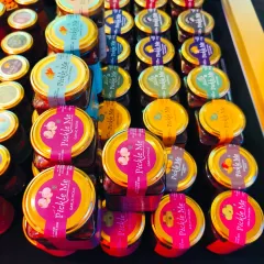 A top-down view of our vegetarian pickle section at a pop-up. The bright labels of our Garlic Pickle and Amla Chunda always catch the eye.