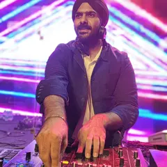 Focused on the mix during a vibrant sangeet party. Every event has a unique energy, and my job is to tune into it and elevate the experience with music.