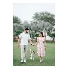 A perfect family portrait. We welcome pets to join your pre-wedding shoot, and this shot of the couple with their happy beagle is a testament to that.