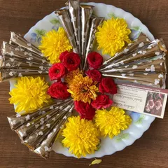 My handmade organic henna cones, ready for you. I arrange them on platters with fresh flowers for events or as special gifts, all prepared in Benson Town, Bangalore.