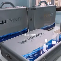 A shot of the completed briefcases for Prince Bathware. After a month of trial and error, we decided on this design which combines a transparent resin top half with an ocean-themed bottom half.