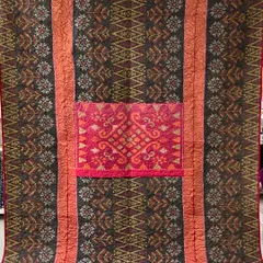 We specialize in transforming cherished sarees into beautiful, functional memory quilts. This piece preserves the intricate patterns and rich colors of a mother's saree, creating a reversible heirloom that can be passed down through generations.