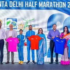 On stage for the Vedanta Delhi Half Marathon 2025 press launch. Organizing major city marathons requires professional collaboration with top sponsors and elite athletes. I handle these high-profile events to ensure a world-class experience for over 40,000 runners.