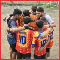 The coach and team in a huddle. This is where passion meets performance.