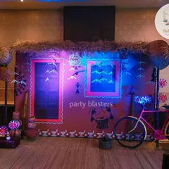 This immersive photo booth was the centerpiece of a corporate party with an Indian village theme. We used authentic materials like hay and woven baskets, combined with creative lighting and rustic props like a decorated bicycle, to create a memorable and interactive experience.