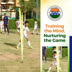 Training the mind, nurturing the game. A young player navigates agility poles, a drill designed to improve close control, balance, and the ability to change direction quickly.