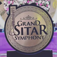 The official emblem for our 'Grand Sitar Symphony'. This represents our unique offering for large-scale events, combining traditional Indian instruments into a powerful orchestral experience.