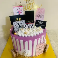 For the shopaholic in your life! This fun drip cake is decorated with edible logos of top fashion brands like Gucci, Zara, and Louis Vuitton.