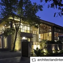 This is a weekend home we designed in Khandala, captured at dusk. Our goal was to create a tranquil escape that blends luxury with nature, using strategic lighting to highlight the architectural form and create a warm, inviting atmosphere against the valley backdrop.