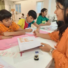 Our instructor provides one-on-one feedback, helping students refine their technique and understand the nuances of letter formation.