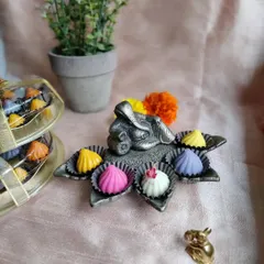 I offer a wide selection of chocolate modaks, with ten flavors ranging from fruity options like orange and strawberry to rich chocolate and nut varieties. Each one is handmade to ensure the highest quality for your festive offerings.