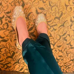My favorite footwear on repeat this festive season. This is a close-up of the crystal-embellished juttis, showing the intricate handwork that goes into each pair. They are crafted with love to bring light to your look.