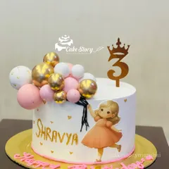 A sweet and simple cake for a 3rd birthday. This design features a girl holding a bouquet of balloons, with delicate pink and gold accents.