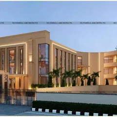 A wider perspective of the commercial complex, showing how the design language extends across the entire structure. The building incorporates terraced outdoor spaces, adding a functional and aesthetic element for patrons.