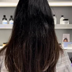 The client's hair before we began the ash blonde highlight service.
