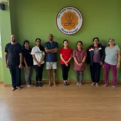 A post-yoga session photo with some of our dedicated students. The energy and connection we share after a class is what makes our community special.