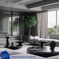 A graphic announcing the ArchDaily 'Building of the Year' nomination for our 'Vaulted B/W Haus' project.