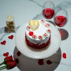 We celebrate love with our heart-shaped red velvet cake. The rich, crimson layers and classic cream cheese frosting are a timeless combination, making this a perfect and romantic choice for an anniversary or Valentine's Day.