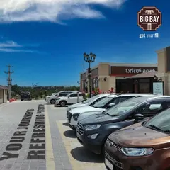 A view of our well-organized parking area, designed for easy access and a hassle-free experience. This is your journey's most refreshing and convenient pitstop.