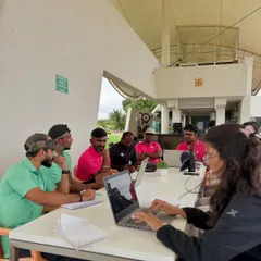 It takes a team to build a champion. Every month, our coaches, trainers, and support staff come together to analyze each athlete's progress, ensuring we are aligned on every goal. Teamwork is our foundation.