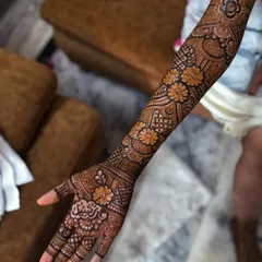 Here you can see a full view of a floral arm design. I focus on creating a balanced look that flows from the palm all the way up the forearm.