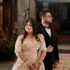 A classic portrait of Navya and Santosh at their reception. The elegant attire and poised look create a timeless and sophisticated image.