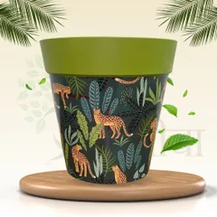 Unleash your wild side with this panther print planter. The 8-inch plastic pot features a lush jungle pattern with leopards, perfect for pairing with leafy green plants to create a tropical vibe.