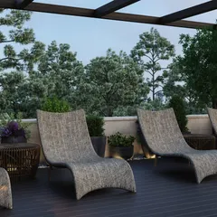 This area of the terrace is dedicated to sunbathing and lounging, with a row of ergonomic woven chaise lounges. The design ensures an open and uncluttered space, perfect for enjoying the sun with a backdrop of trees.